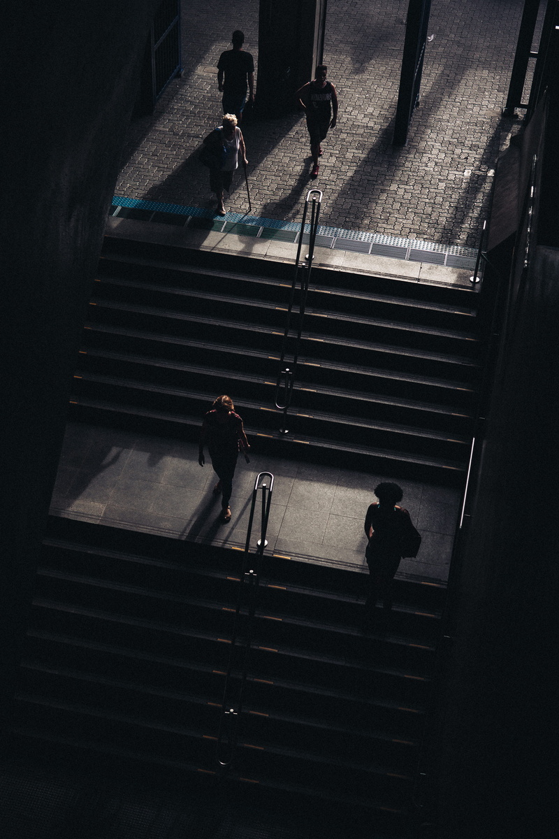 pavement, people, architecture, indoors, sunlight, real people, shadow, city, handrails, walking, urban, stairs, 5K, photography, lifestyles, wear, male