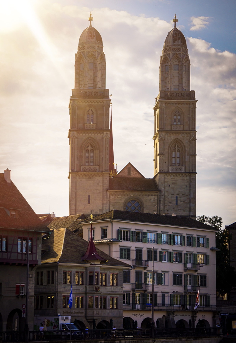 city, tower, built structure, travel, church, grossmünster, architecture, sunlight, spire, place of worship, zürich, 4K, nature, belief, sky, towers, spirituality