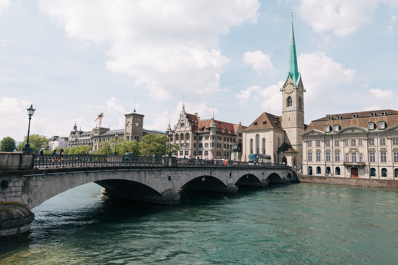 water, cloud - sky, outdoors, connection, no people, zurich, travel, day, tower, sky, limmat, summer, arch bridge, bridge, travel destinations, waterfront