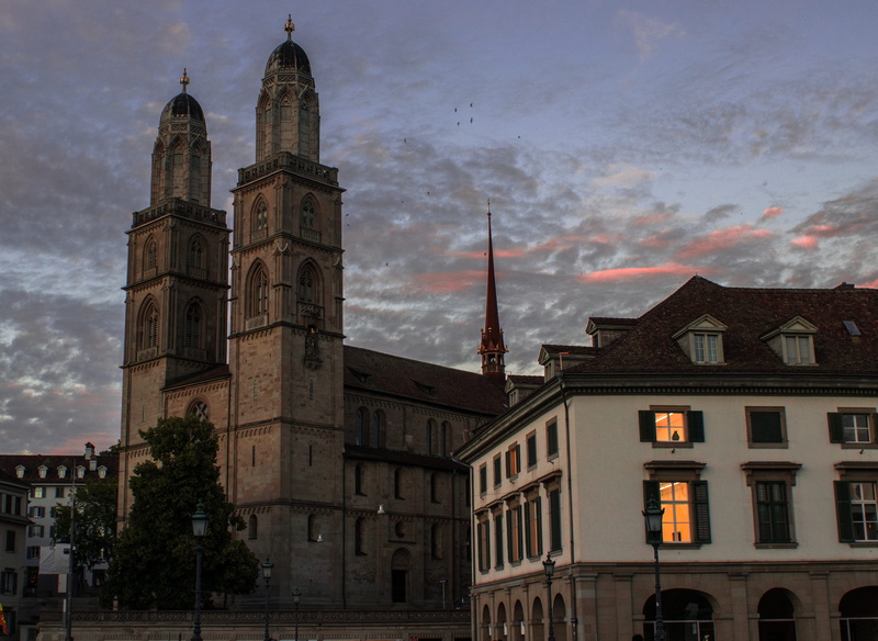 church, religion, outdoors, building, zurich, built structure, architecture, building exterior, dusk, spire, spirituality, travel destinations, no people
