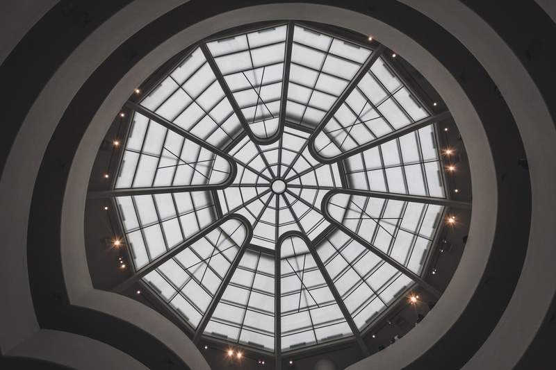 housing, restaurant, architecture and art, tower, sunlight, skylight, transparent, cupola, vault ceiling, bell tower, low angle view, window, guggenheim new york
