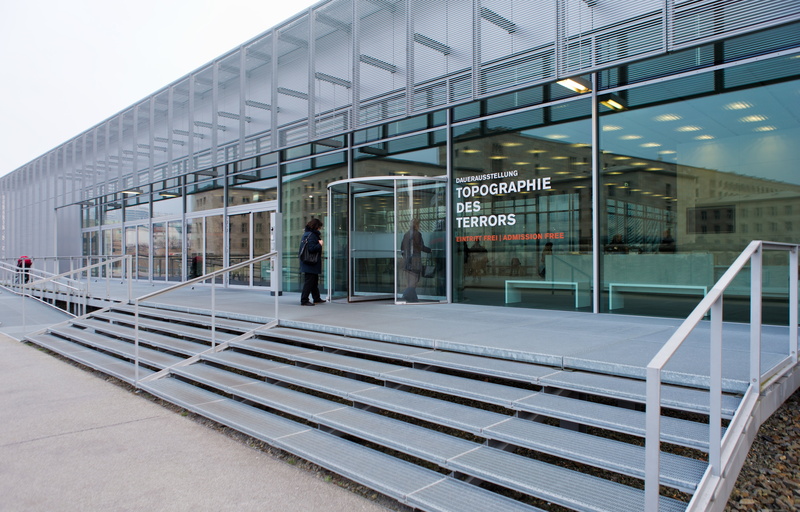 outdoors, day, revolving door, steel, building exterior, modern, office, nature, walking, adult, building, 5K, staircase, people, business, city, entering