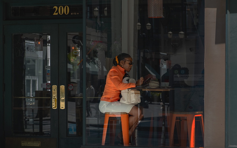 glass, sitting, transparent, architecture, men, san jose, three quarter length, transportation, store, reflection, shorts, orange, wireless technology