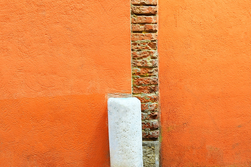 building exterior, backgrounds, walkway, banister, day, brown, flagstone, pipe - tube, home decor, rug, wall, colors, close-up, textured, orange, red, apparel