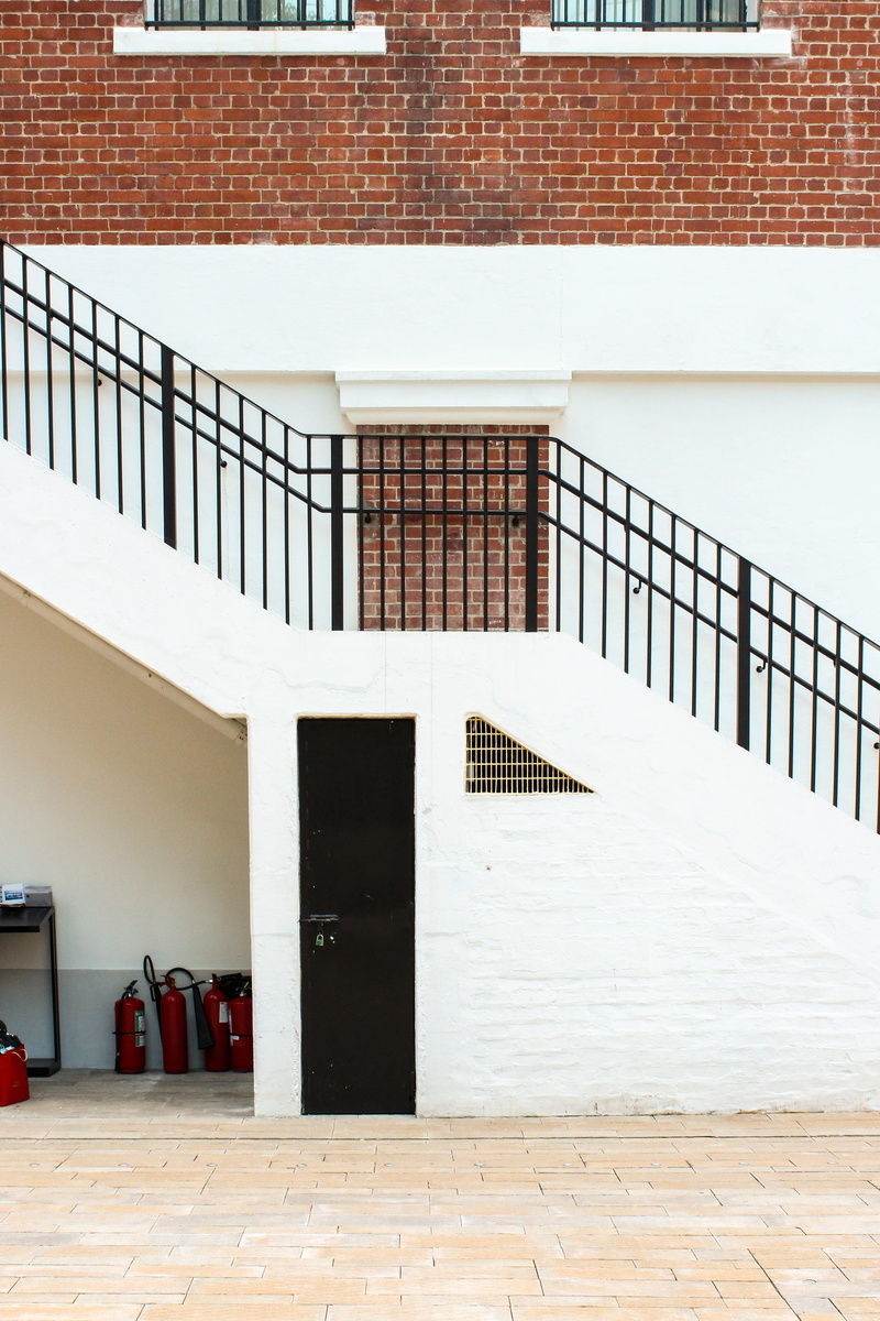 built structure, staircase, stairs, apparel, spoke, potted plant, building exterior, garage, inside, no people, building, flooring, wheel, clothing, steps and staircases