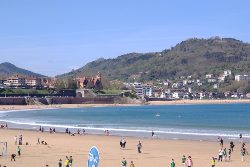 sea, trip, building exterior, holiday, coastline, water, group of people, sky, people, nature, day, the concha bay, land, sand, architecture, landscape