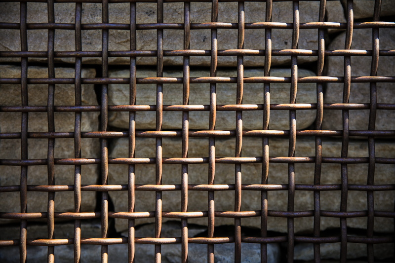 design, brown, texture, rusty, wall - building feature, sunlight, 8K, in a row, shape, steel, indoors, security, repetition, close-up, background, stone