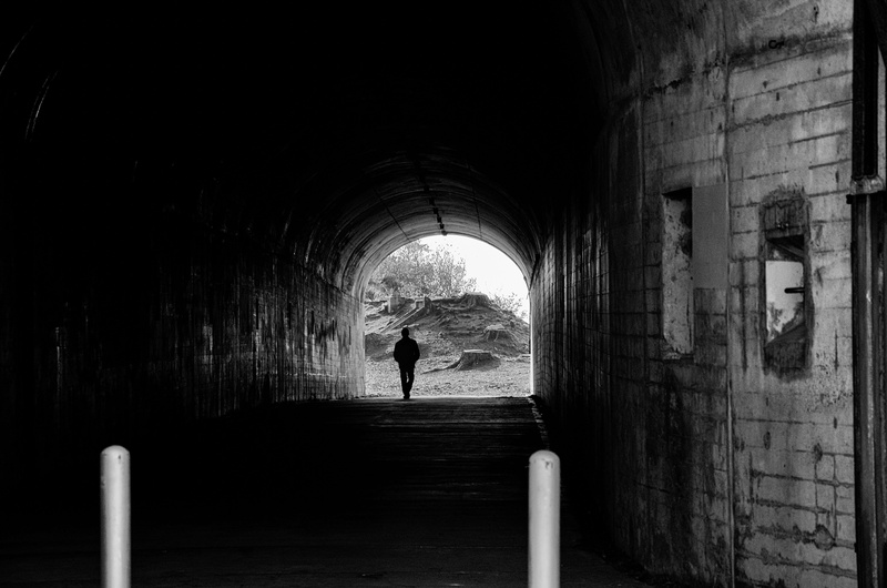 4K, built structure, rear view, standing, men, headlands, real people, arch, light at the end of the tunnel, one person, walking, lifestyles, full length