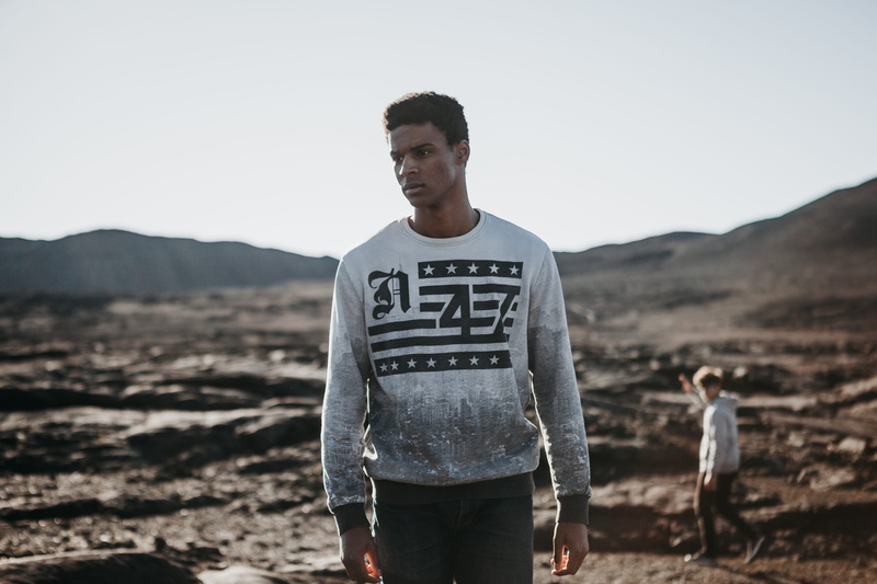 leisure activity, young men, seriou, front view, land, fashion, mountain, model pose, posing, people, nature, african american, three quarter length, looking at camera