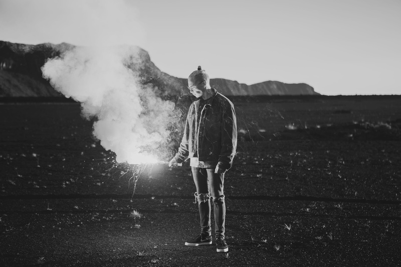smoke bomb, outdoors, dust, bomb, environment, black and white, standing, lifestyles, leisure activity, holding, real people, man, everywhere i go, smoke