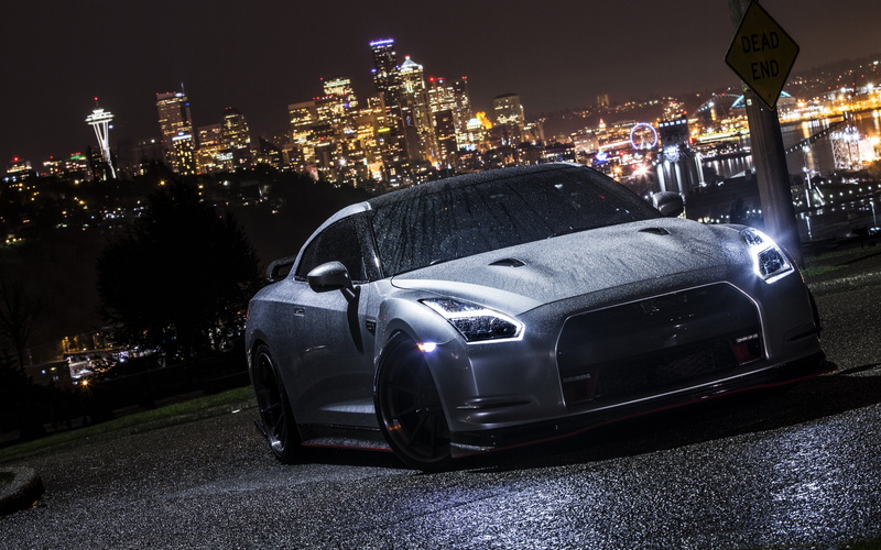 office building exterior, building exterior, no people, nature, building, road, wet, nissan gt-r, mode of transportation, transportation, luxury, night