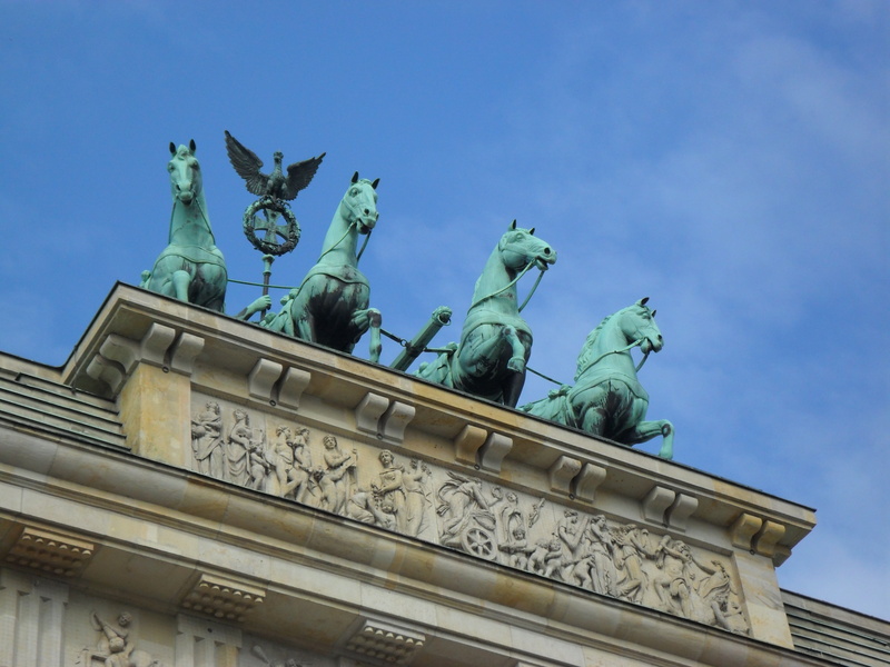 brandenburg gate, germany, art and craft, human representation, city gate, sky, statue, outdoors, low angle view, horse, history, sculpture, no people