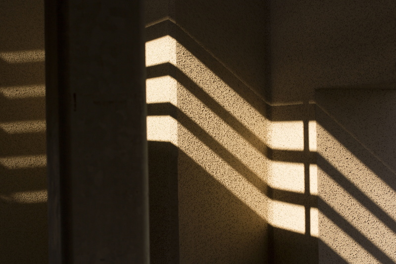 architecture, wall - building feature, rough, focus on shadow, nature, indoors, steps and staircases, shadow, staircase, architectural column, railing