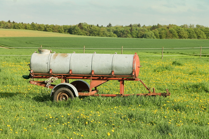 pasture, water tank, tree, nature, water bottle, beauty in nature, water donation, field, animal husbandry, no people, dare, potions cart, drinking water car