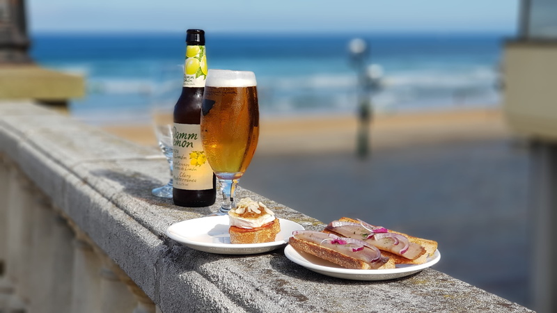 beer bottle, freshness, table, beer, bun, goblet, lager, meal, beside, cocktail, alcohol, bread, food, food and drink, water, beverage, daytime, railing