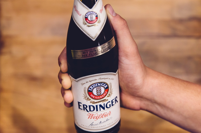 german, human limb, Bottle, hand, alcohol, western script, body part, females, human body part, adult, beer label, White Beer, drink, beer, bavarian, refreshment