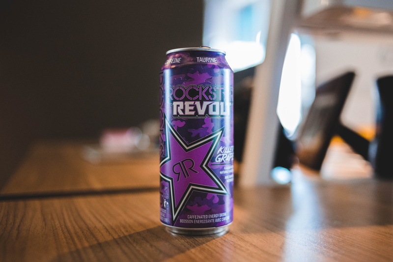 western script, label, brown, liquor, purple, communication, soda, deodorant, spray can, table, tin, beer, can, aluminium, drink, creativity, invertebrate
