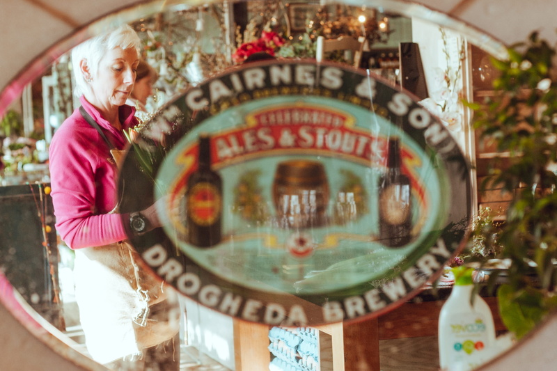 ireland, ale, people, technology, men, communication, sign, arranging, reflection, senior adult, lifestyles, stout, indoors, one person, 2K, flowers, signage