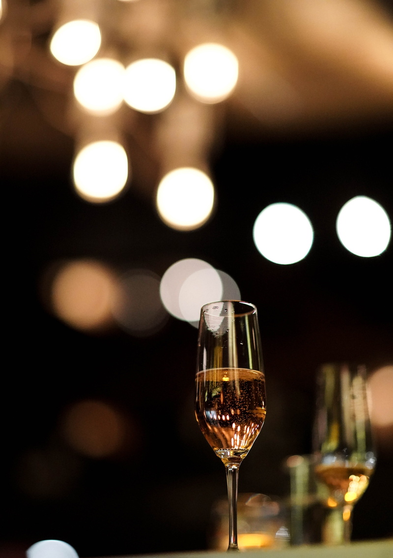 close-up, liquor, red wine, bar counter, glass - material, wine bottle, restaurant, beverage, goblet, night, focus on foreground, cocktail, night club