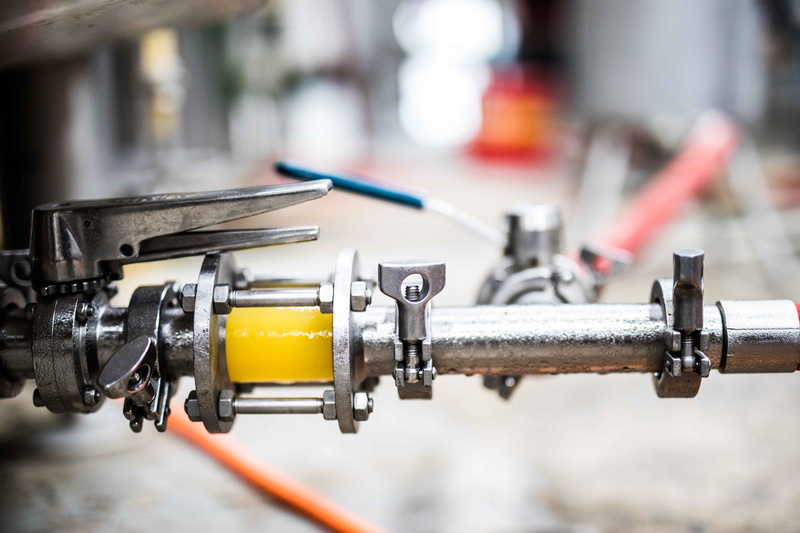 city, table, equipment, tap, industry, outdoors, machine part, focus on foreground, machine valve, light, technology, wooden, close-up, summer, tool, bar