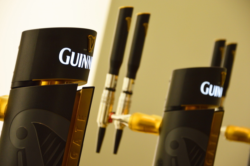 research, studio shot, close-up, irish beer, food and drink, still life, communication, indoors, guinness, alcohol, stout beer, label, text, arts culture and entertainment