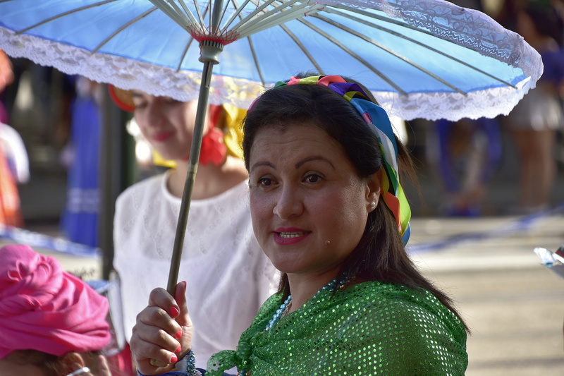 umbrella, rain, incidental people, focus on foreground, real people, lifestyles, celebration, leisure activity, protection, looking at camera, headshot