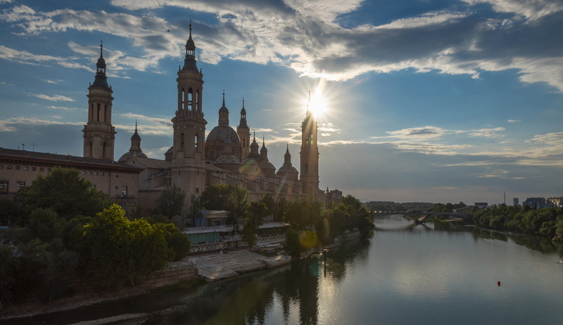 religion, spirituality, europe, building, sky, built structure, water, steeples, cloud - sky, nature, church, tree, plant, landscape, travel destinations