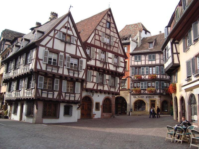 row house, footpath, sky, day, city, urban Scene, town, incidental people, france, house, history, architecture, window, half-Timbered, facade, transportation