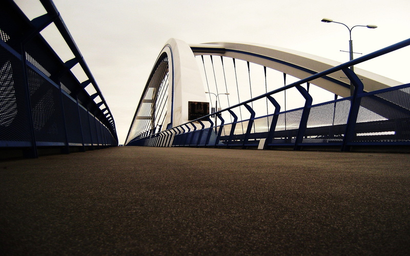 transportation, lighting equipment, footpath, day, outdoors, architecture, surface level, 2K, travel destinations, steel, connection, sky, street, no people