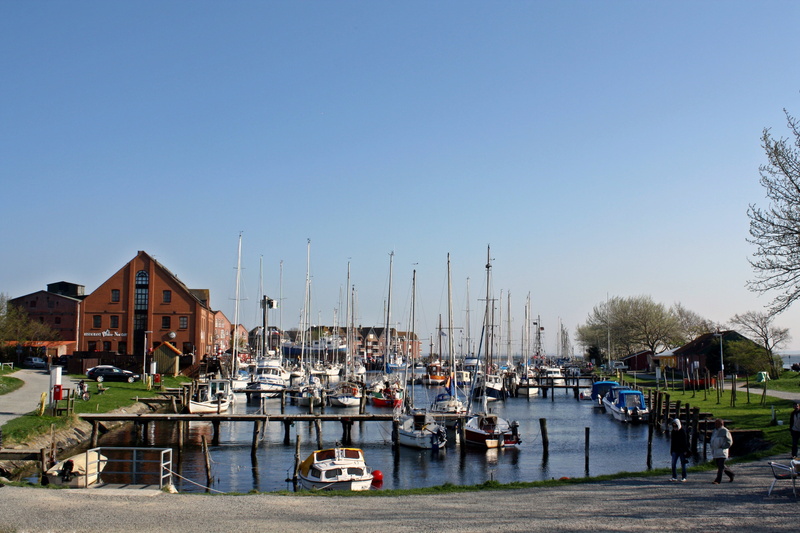 canal, moored, built structure, city, yacht, clear sky, port, architecture, building exterior, baltic sea, sailboat, sky, pole, sailing boats, orth on fehmarn