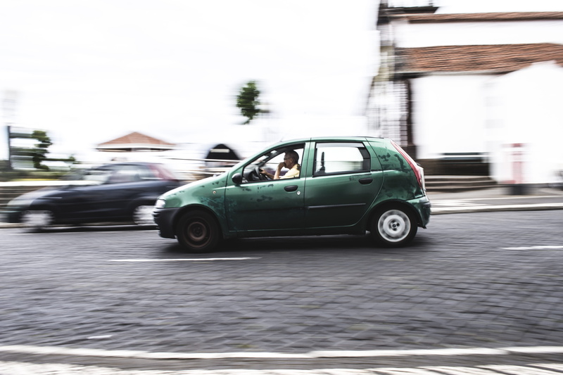 retro styled, person, transportation, cars, hatchback, road, depth of field, architecture, day, 5K, luxury, motor vehicle, land vehicle, on the move, focus