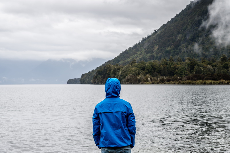 water, mist, weather, misty, mountain, clothing, hoodie, body, fog, real people, clouds, back, hood, recreation, rainy day, loneliness, island, outdoors