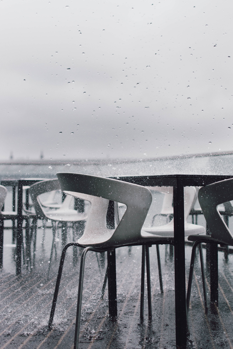 grayscale, black-and-white, outdoors, snowing, chair, nature, empty, reflection, beach, rainy season, seat, 5K, raindrops, street, no people, bad weather