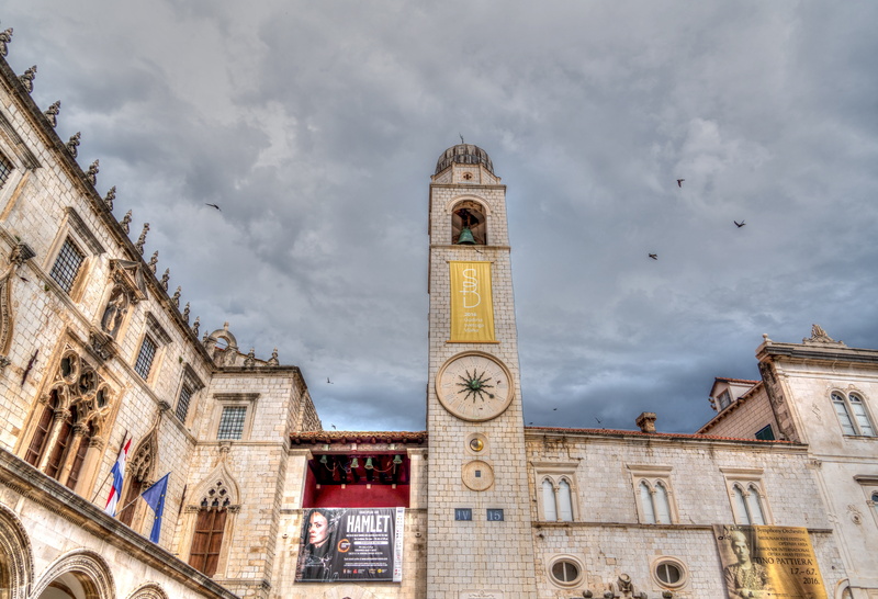 Architecture, tourism, tower, travel, birds, city, built structure, religion, clock face, scenic, building exterior, cityscape, cloud - sky, spirituality