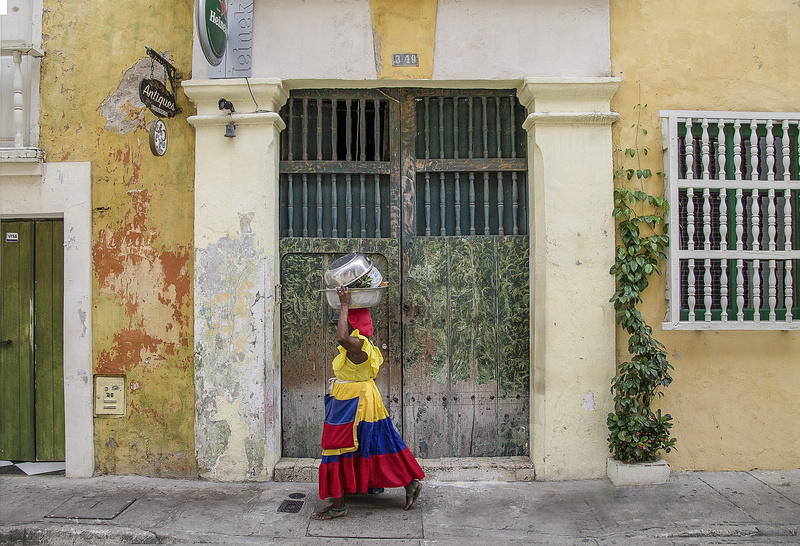 female, façade, women, protection, built structure, doors, clothing, pedestrian, colombia, yellow, tradition, native, american, latin, standing, tribal