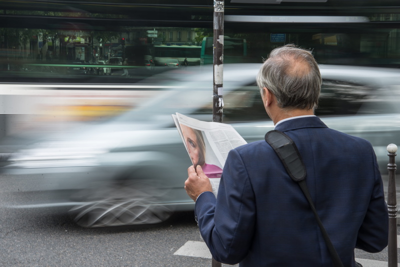 city, motion, on the move, well-dressed, men, road, traffic, vehicle, businessman, reading, concrete, blue, males, wearing, transportation, jacket, man