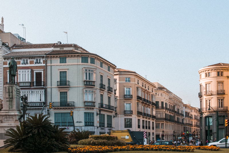 balcony, architecture, house, clear sky, buildings, street, vacation, car, daylight, center, urban, residential district, building story, apartment, no people