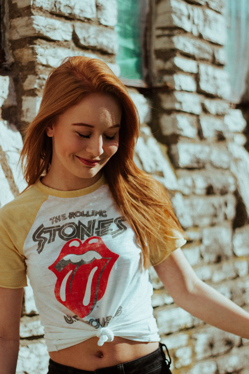 shirt, t-shirt, hair, unsplash, female, teenager, love, young women, standing, wall, casual clothing, 5K, closing, girl, smile, lifestyles, real people