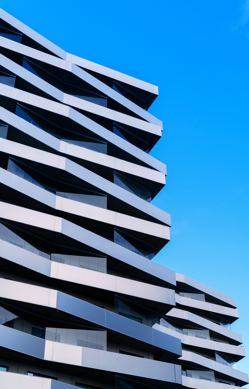 building, geometric, nature, office building exterior, downtown, day, modern, tall - high, high, high rise, town, photo, angle, symmetry, city, urban, built structure