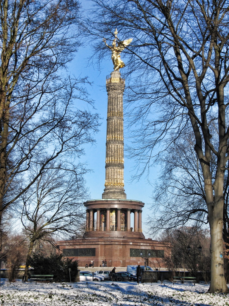 snowy, plant, bare tree, human representation, monument, Tiergarten, snow, built structure, sky, trees, tall - high, art and craft, sculpture, architectural column
