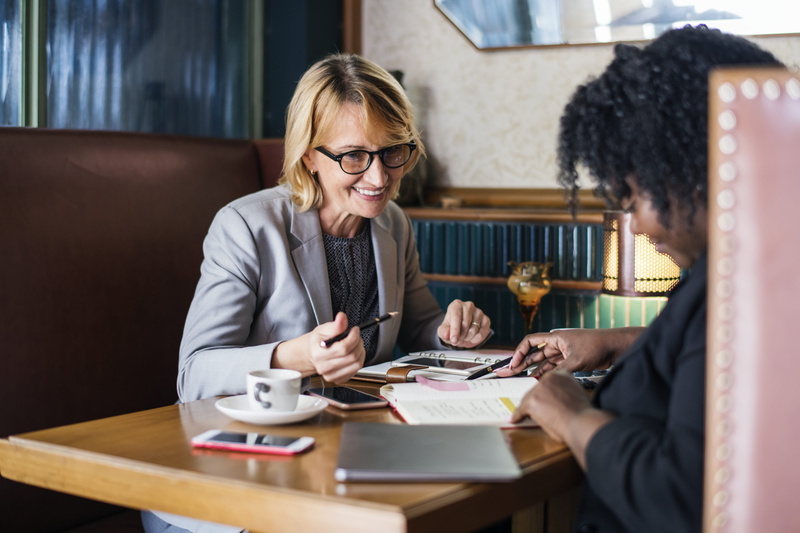 notebook, real people, mature, women, formal, glasses, coffee, discussion, adult, mature adult, manager, togetherness, european, development, eyeglasses