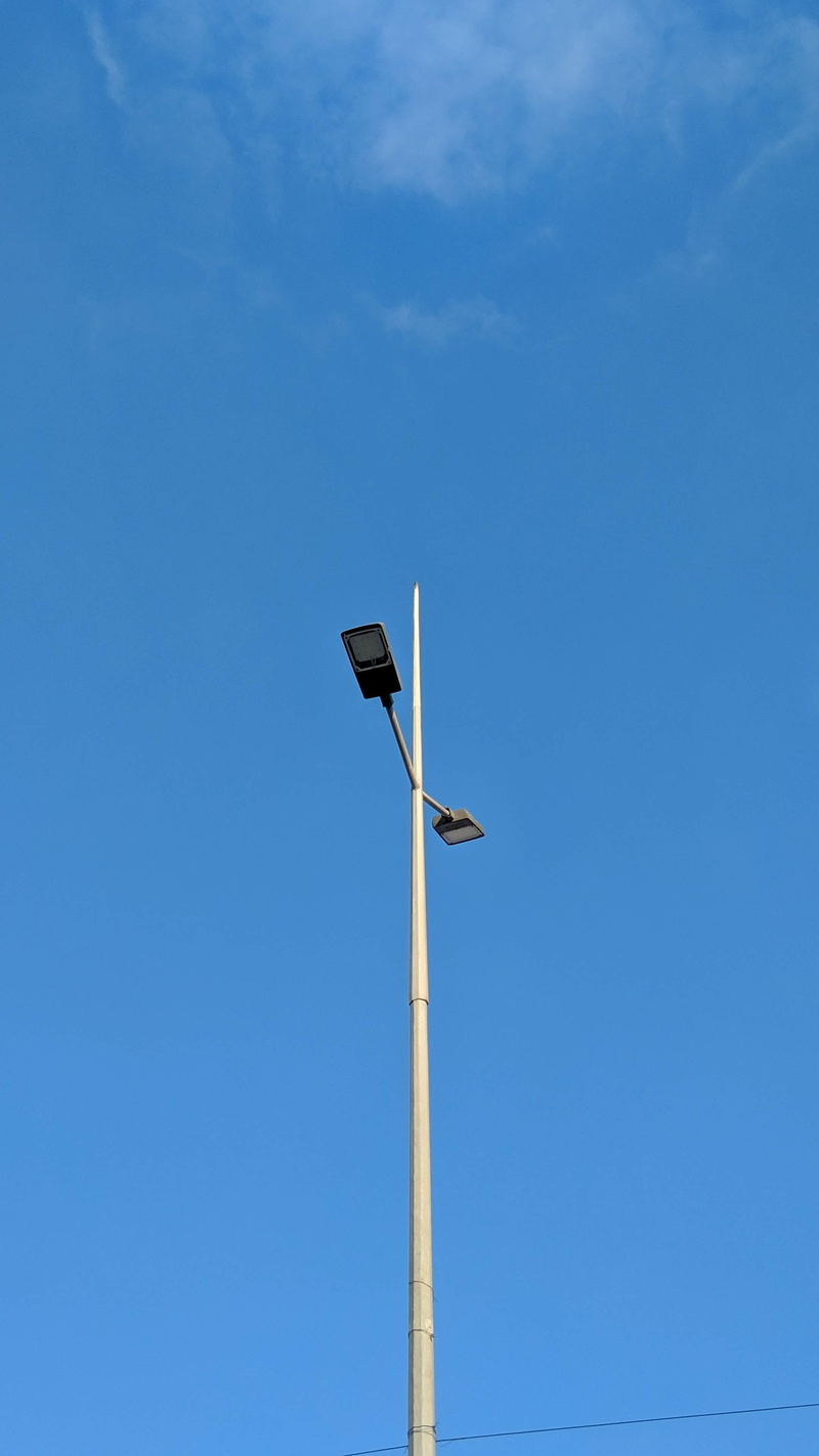 environment, no people, blue, street light, trademark, logo, streetlight, sustainable resources, environmental conservation, sky, chennai, lamp post, street
