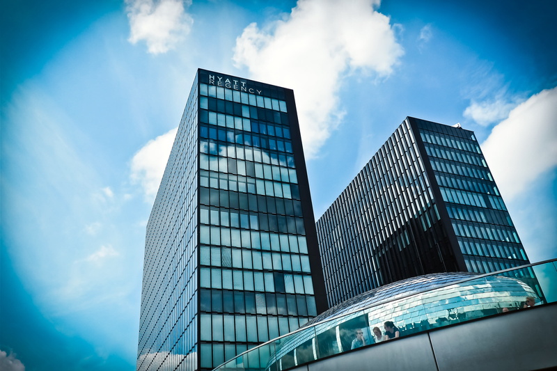 sky, glass front, glazing, skyscraper, no people, reflection, built structure, glass, day, low angle view, modern, building exterior, office, facade, glass facades