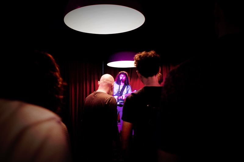 electric lamp, music, real people, illuminated, medium group of people, indoors, women, newtown, rear view, arts culture and entertainment, punk, guitar