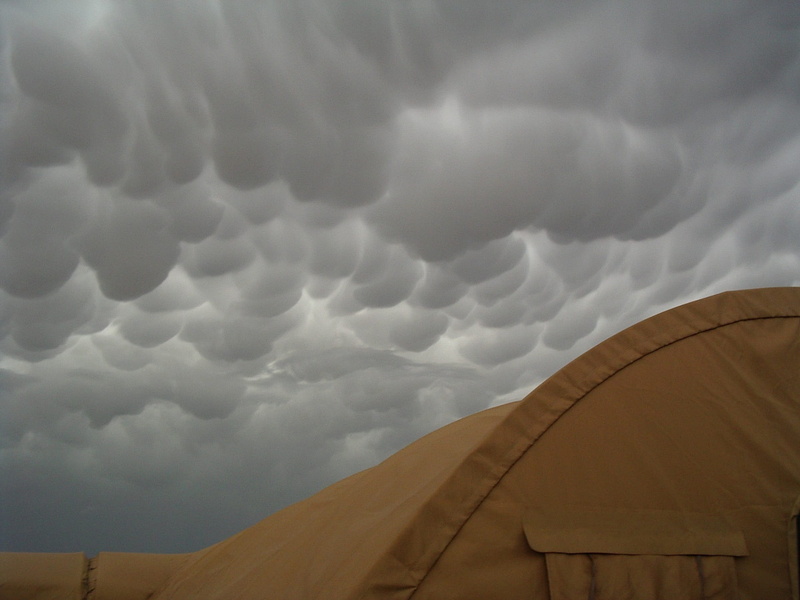 outdoors, colorful, nature, power in nature, architecture, mammatus clouds, storm, mountain, building exterior, Sky, weather, dramatic, low angle view