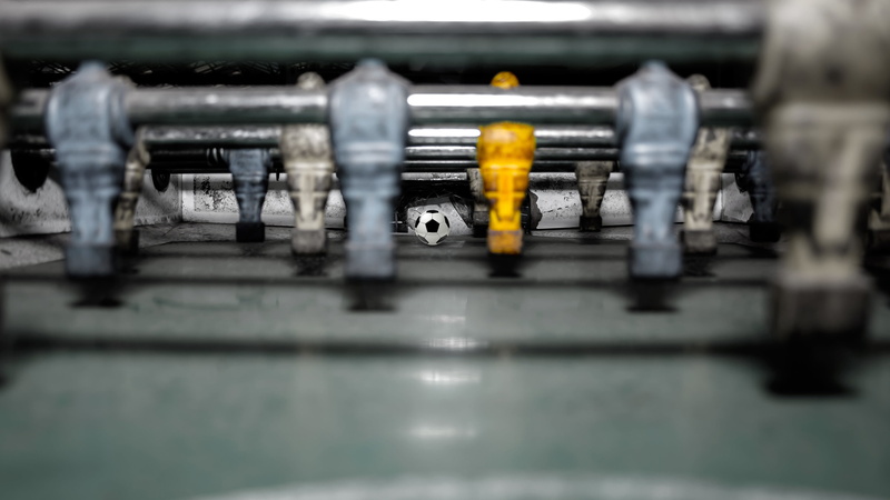 technology, sport, industry, players, machinery, indoors, ball, fossil fuel, large group of objects, selective focus, football, fire doors, fun, transportation