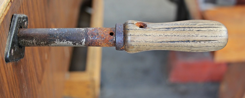 close up, silver colored, football figures, wooden kicker handle, wall - building feature, wood, metal, kicker box, handle, game table, door, football