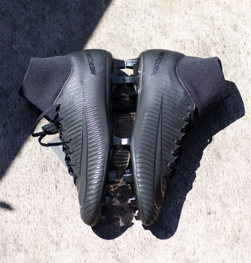 football boots, personal accessory, boots, camera - photographic equipment, land, sunny, outdoors, photography themes, shadow, absence, 4K, day, football