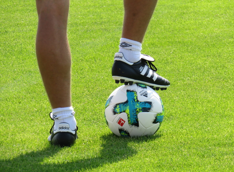 human body part, sock, child, activity, leisure activity, space, Leisure, football, team sport, socer, nature, legs, break, competition, outdoors, shoe