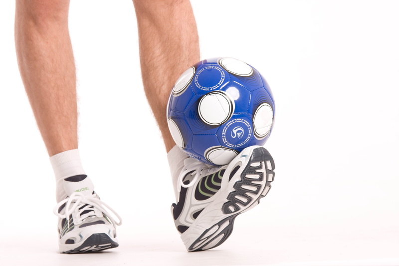 human Hand, men, human limb, studio Shot, playing, sport, action, sports uniform, shorts, one Person, foot, holding, caucasian Ethnicity, human Foot, ball